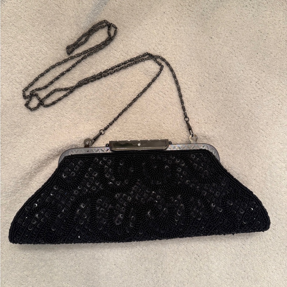 Elegant Black Clutch with Frame Closure and Chain Strap